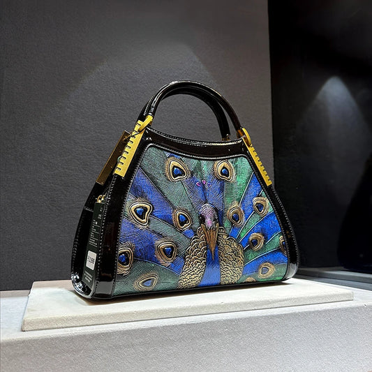 On sale! Women's handbag in high-quality cowhide leather with a peacock print. Shoulder strap is adjustable