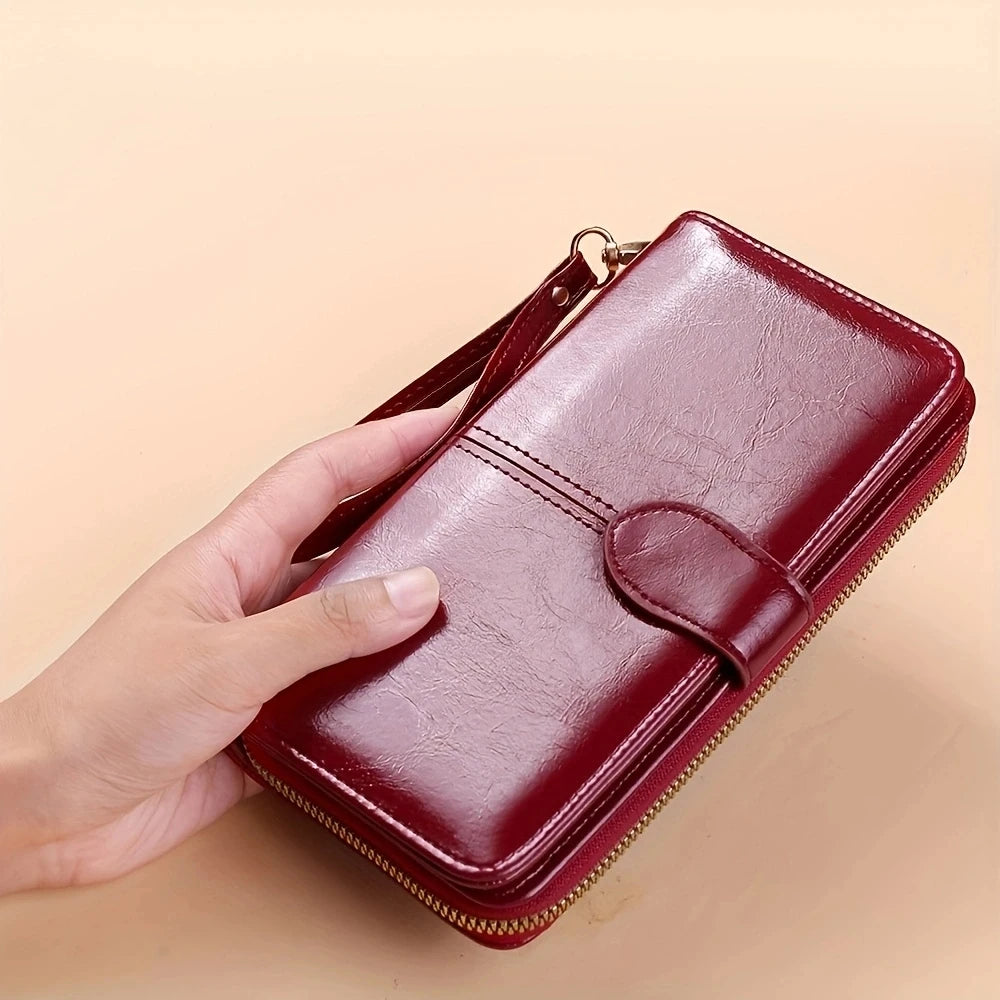 Women's leather wallet with coin and card compartments, available in a variety of colors.