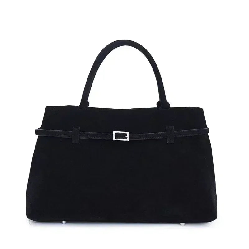 Women's handbag made of synthetic suede with a decorative buckle, large capacity, and snap closure