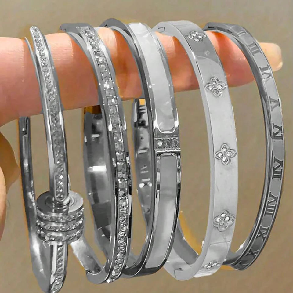 Set of 5 stainless steel bracelets—charming, delicate, and modern—featuring sparkling cubic zirconia