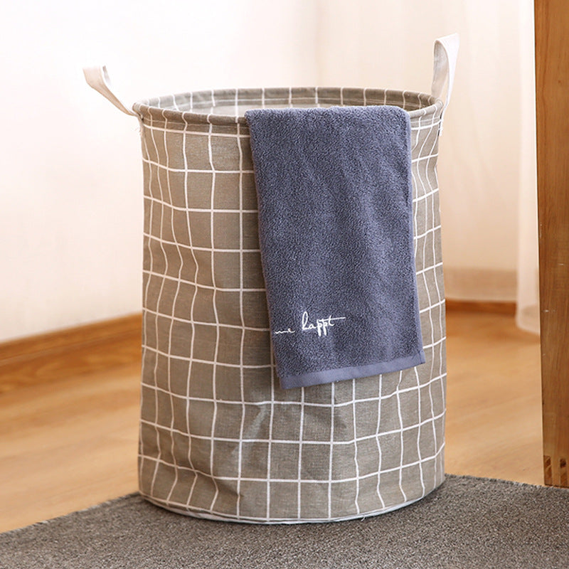 Round, portable fabric laundry basket, ideal for the laundry room or bathroom