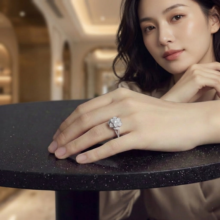 Elegant women's ring in premium 925 sterling silver featuring a three-dimensional design of intertwined roses and white cubic zirconia