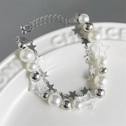 Adjustable bracelet with a double zinc alloy chain, featuring pearls and resin stars, ideal as a gift for girls. Beautiful, lightweight, and charming