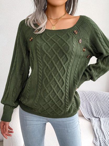 Women's sweater with puff sleeves, textured buttons, and a round neck