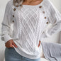 Women's sweater with puff sleeves, textured buttons, and a round neck