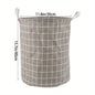Round, portable fabric laundry basket, ideal for the laundry room or bathroom