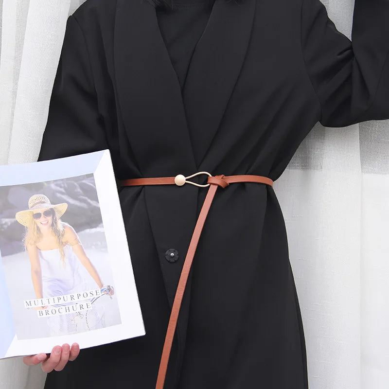Women's leather belt with a stylish and versatile metal buckle, ideal for pairing with dresses, coats, and sweaters