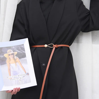 Women's leather belt with a stylish and versatile metal buckle, ideal for pairing with dresses, coats, and sweaters