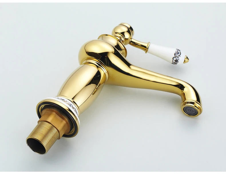 Bathroom faucet with antique bronze finish, made of solid brass, for washbasin, with single lever and water mixer