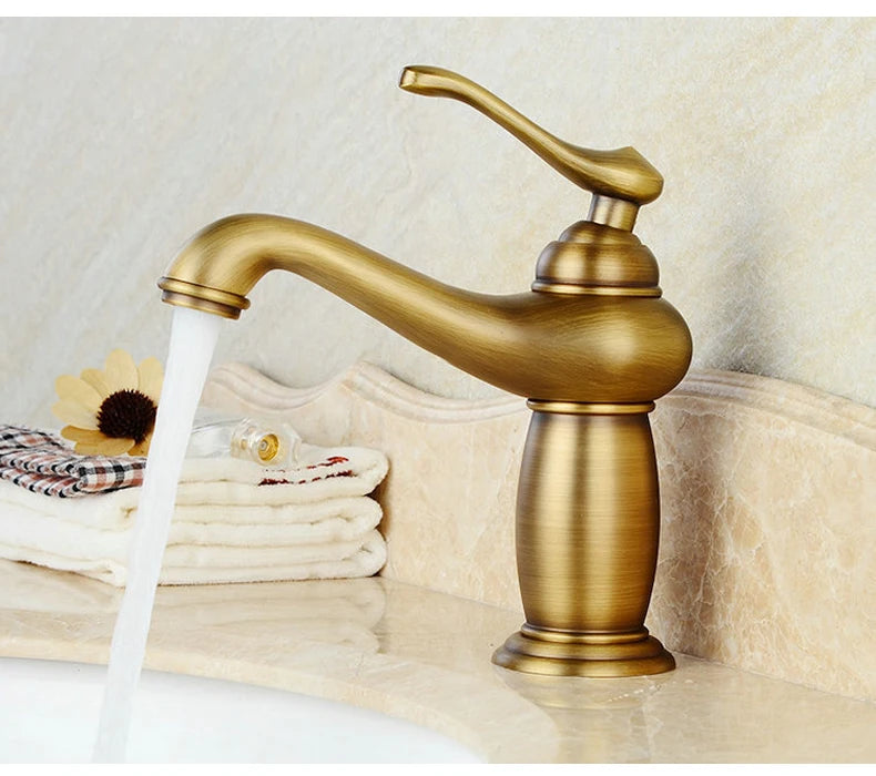 Bathroom faucet with antique bronze finish, made of solid brass, for washbasin, with single lever and water mixer
