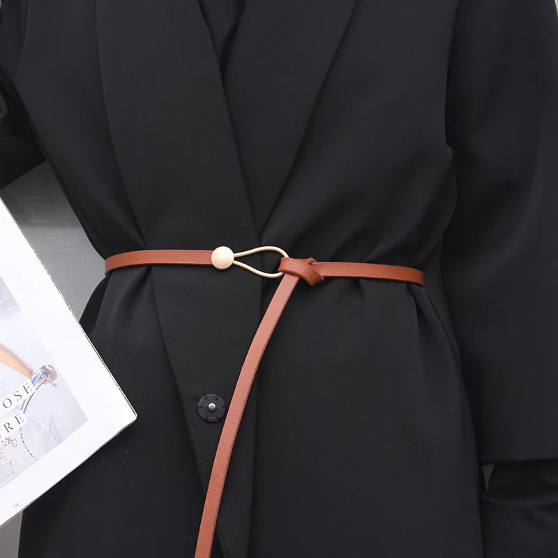 Women's leather belt with a stylish and versatile metal buckle, ideal for pairing with dresses, coats, and sweaters