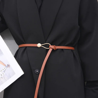Women's leather belt with a stylish and versatile metal buckle, ideal for pairing with dresses, coats, and sweaters