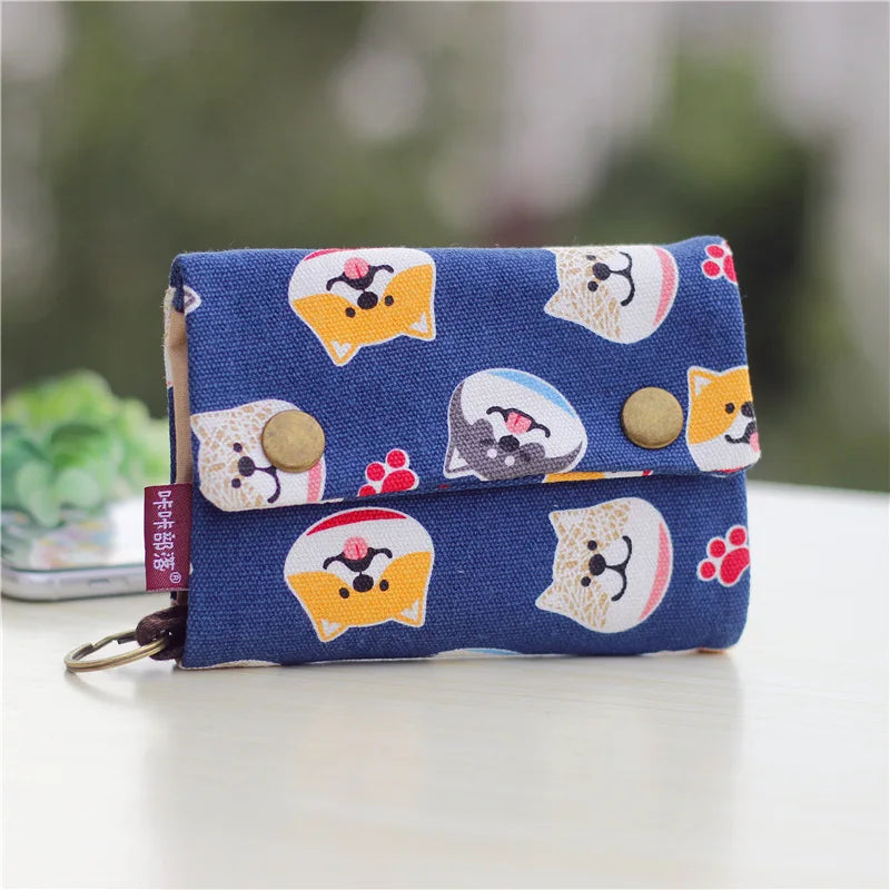 Women's wallet with cartoon print for girls, with key holder and coin purse in various designs.