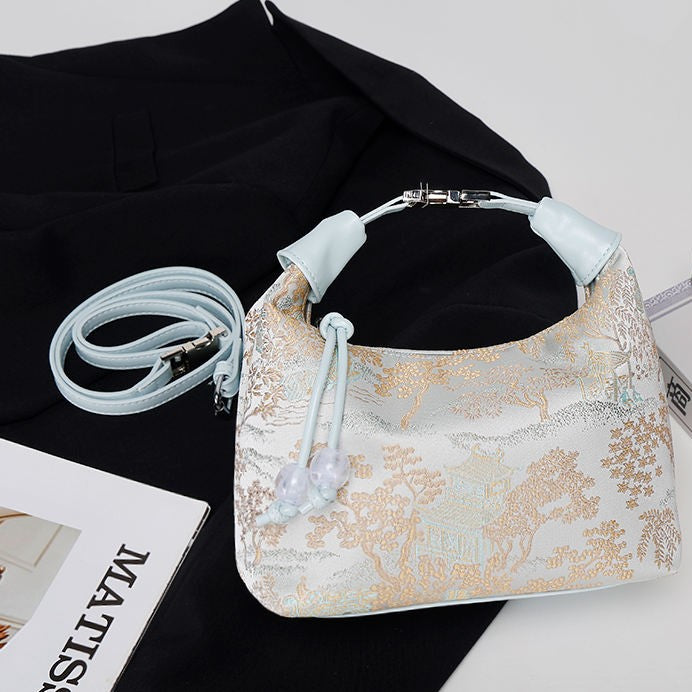 Women's embroidered handbag with zipper, made of silky fabric, adjustable strap