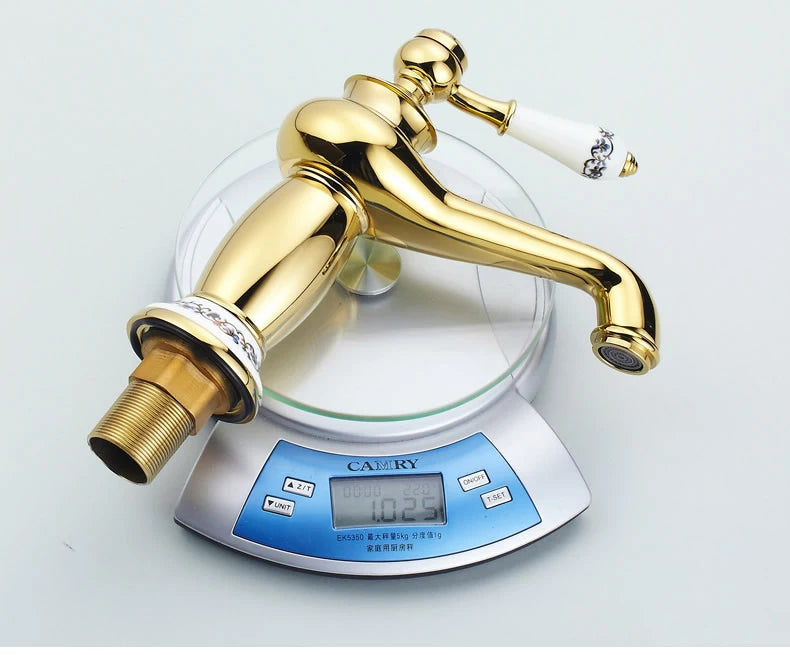 Bathroom faucet with antique bronze finish, made of solid brass, for washbasin, with single lever and water mixer