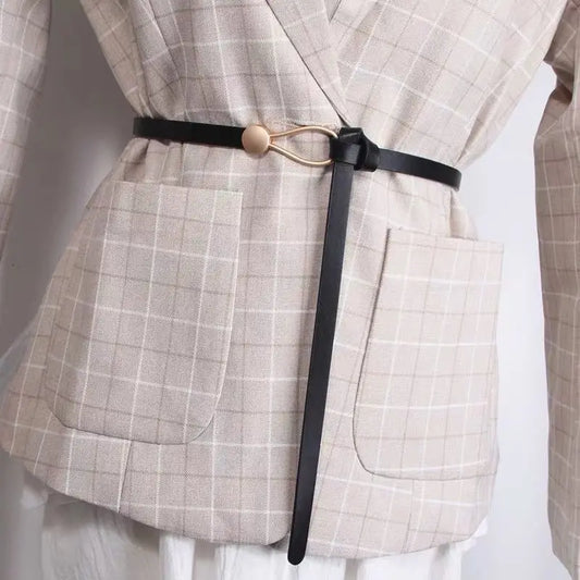 Women's leather belt with a stylish and versatile metal buckle, ideal for pairing with dresses, coats, and sweaters
