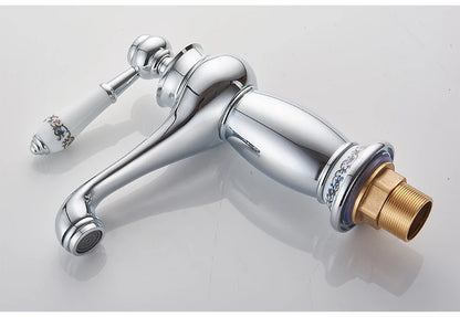 Bathroom faucet with antique bronze finish, made of solid brass, for washbasin, with single lever and water mixer