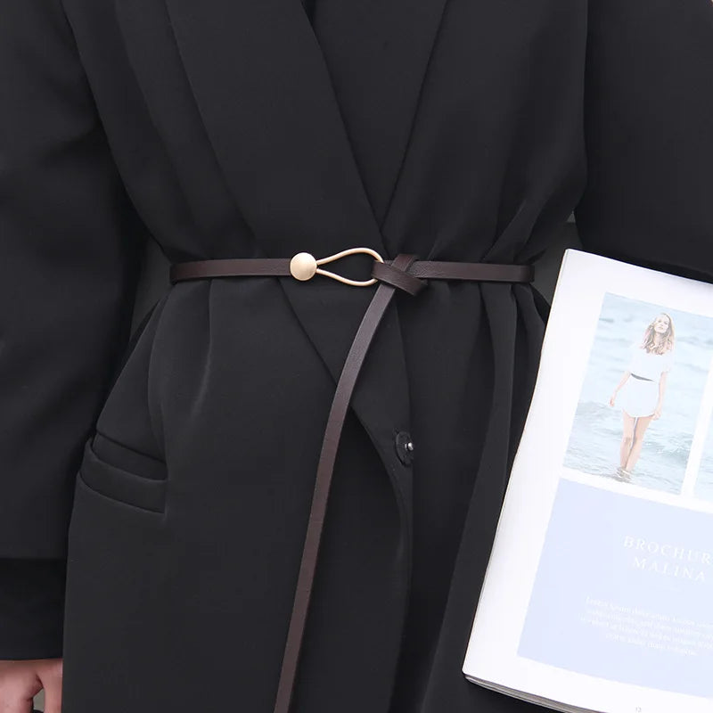 Women's leather belt with a stylish and versatile metal buckle, ideal for pairing with dresses, coats, and sweaters