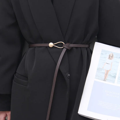 Women's leather belt with a stylish and versatile metal buckle, ideal for pairing with dresses, coats, and sweaters