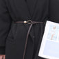 Women's leather belt with a stylish and versatile metal buckle, ideal for pairing with dresses, coats, and sweaters