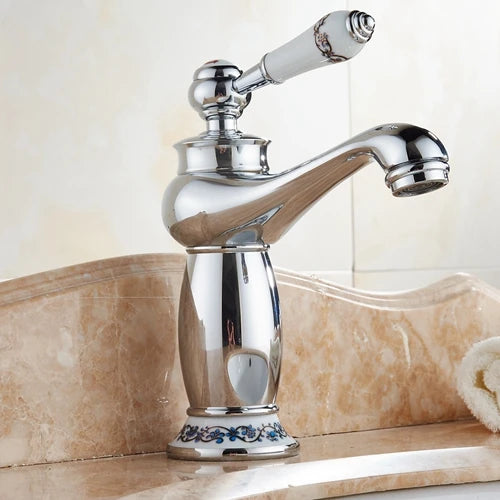 Bathroom faucet with antique bronze finish, made of solid brass, for washbasin, with single lever and water mixer