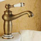 Bathroom faucet with antique bronze finish, made of solid brass, for washbasin, with single lever and water mixer