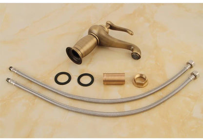 Bathroom faucet with antique bronze finish, made of solid brass, for washbasin, with single lever and water mixer