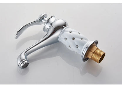 Bathroom faucet with antique bronze finish, made of solid brass, for washbasin, with single lever and water mixer