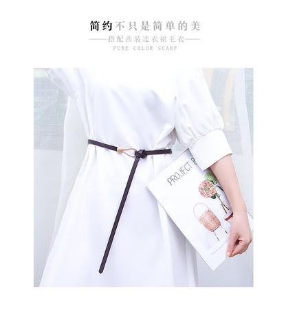 Women's leather belt with a stylish and versatile metal buckle, ideal for pairing with dresses, coats, and sweaters