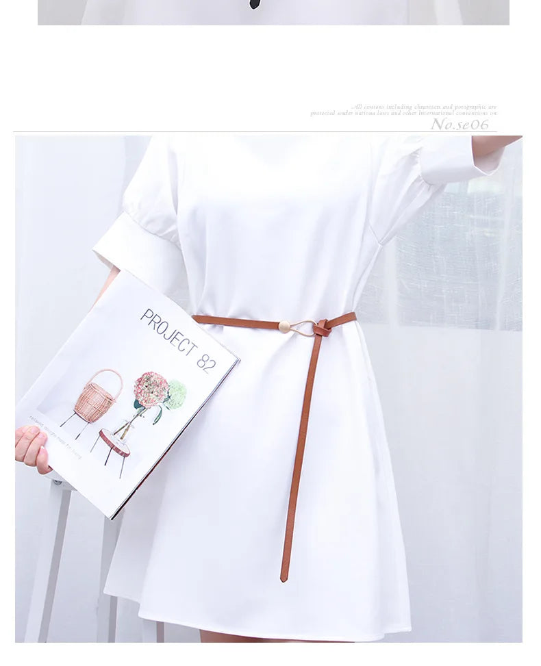 Women's leather belt with a stylish and versatile metal buckle, ideal for pairing with dresses, coats, and sweaters