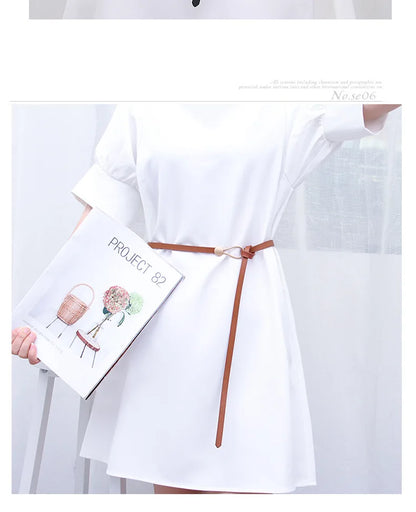 Women's leather belt with a stylish and versatile metal buckle, ideal for pairing with dresses, coats, and sweaters