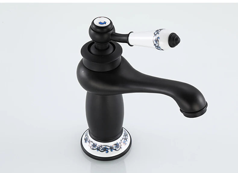 Bathroom faucet with antique bronze finish, made of solid brass, for washbasin, with single lever and water mixer