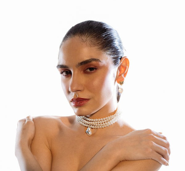 Sophisticated and elegant classic multi-strand choker necklace featuring round pearls and a pearl pendant, perfect for parties and other special occasions