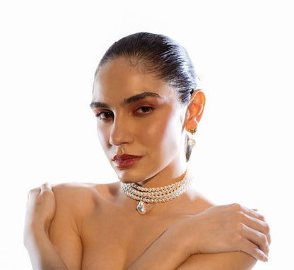 Sophisticated and elegant classic multi-strand choker necklace featuring round pearls and a pearl pendant, perfect for parties and other special occasions