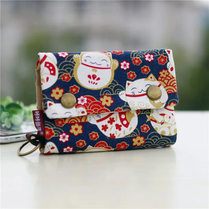 Women's wallet with cartoon print for girls, with key holder and coin purse in various designs.