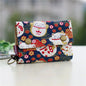 Women's wallet with cartoon print for girls, with key holder and coin purse in various designs.