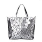 Women's beach-style holographic shoulder bag in various colors.