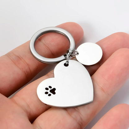 Set of 3 decorative stainless steel keychains in the shape of a heart and paws, with identification tags for dogs