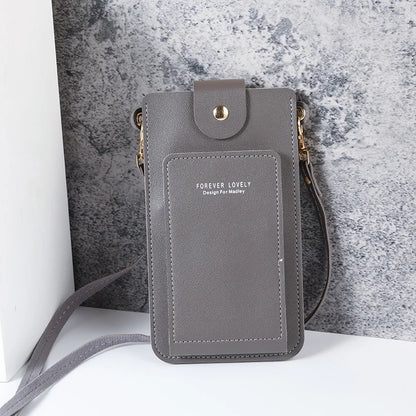 Modern shoulder bag in a solid color, with compartments for cell phone, wallets, and document holder