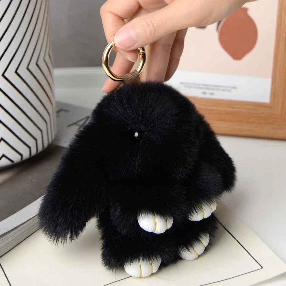 Adorable and fun women's keychain with a rabbit fur pendant.