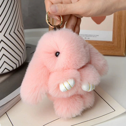 Adorable and fun women's keychain with a rabbit fur pendant.