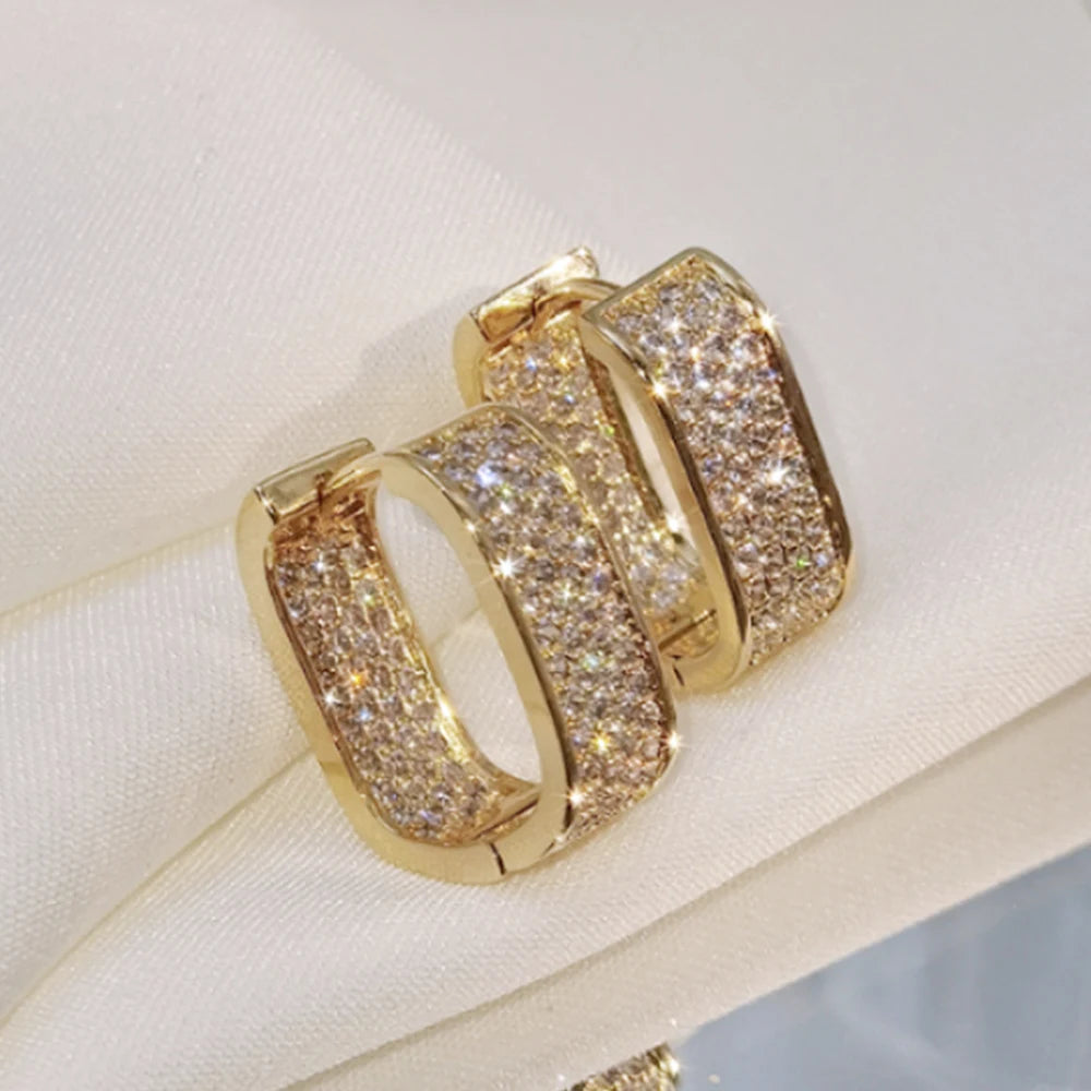 Women's silver or gold hoop earrings set with cubic zirconia