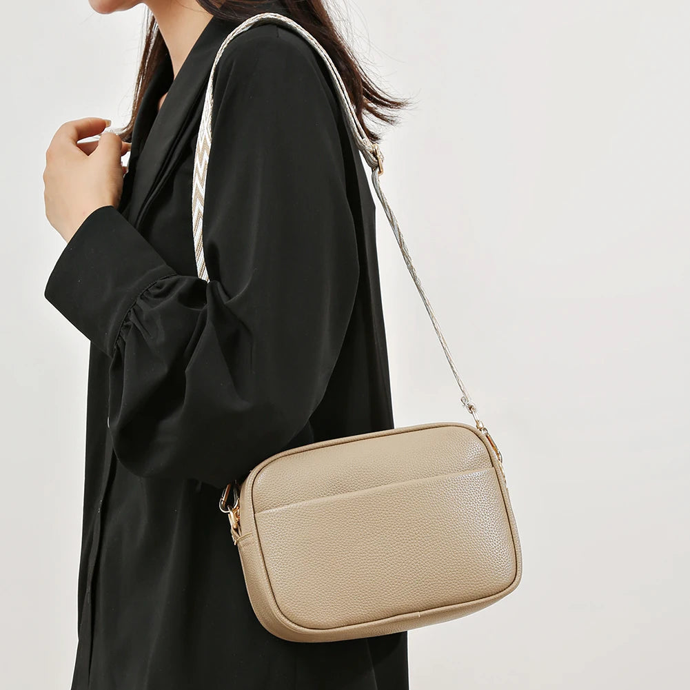 Women's leather tote bag, classic style with crossbody strap and chain detail
