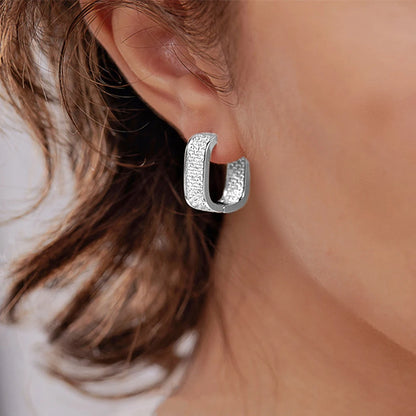 Women's silver or gold hoop earrings set with cubic zirconia