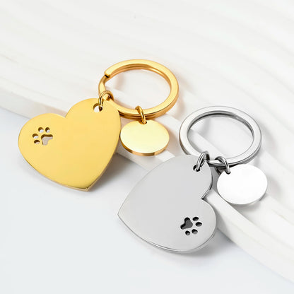 Set of 3 decorative stainless steel keychains in the shape of a heart and paws, with identification tags for dogs