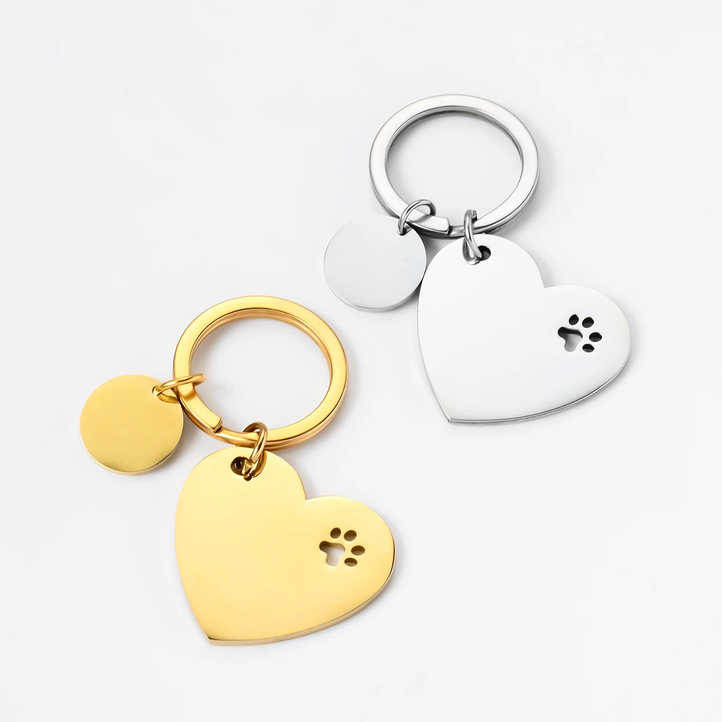 Set of 3 decorative stainless steel keychains in the shape of a heart and paws, with identification tags for dogs