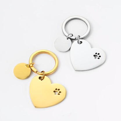 Set of 3 decorative stainless steel keychains in the shape of a heart and paws, with identification tags for dogs