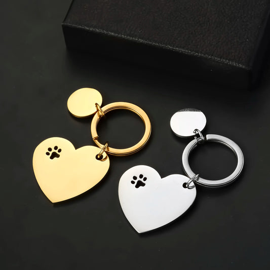 Set of 3 decorative stainless steel keychains in the shape of a heart and paws, with identification tags for dogs