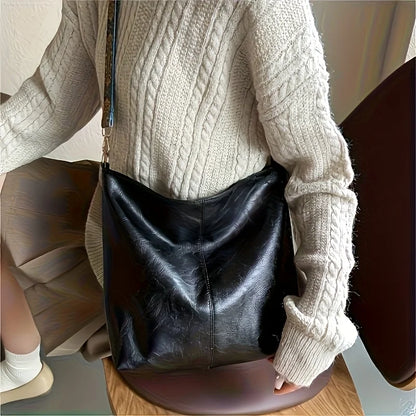 Women's bohemian-style handbag with vintage embroidery and a wide strap