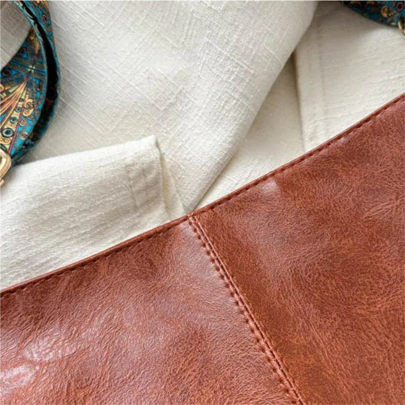 Women's bohemian-style handbag with vintage embroidery and a wide strap